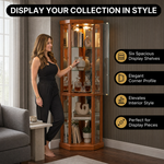 Person arranging décor inside the open glass door of the tall oak corner curio cabinet