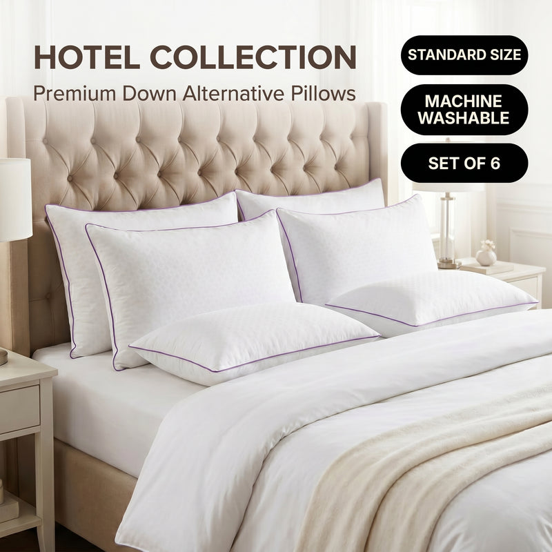 Down alternative pillows stacked on a bed against a gray tufted headboard under a Hotel Collection banner