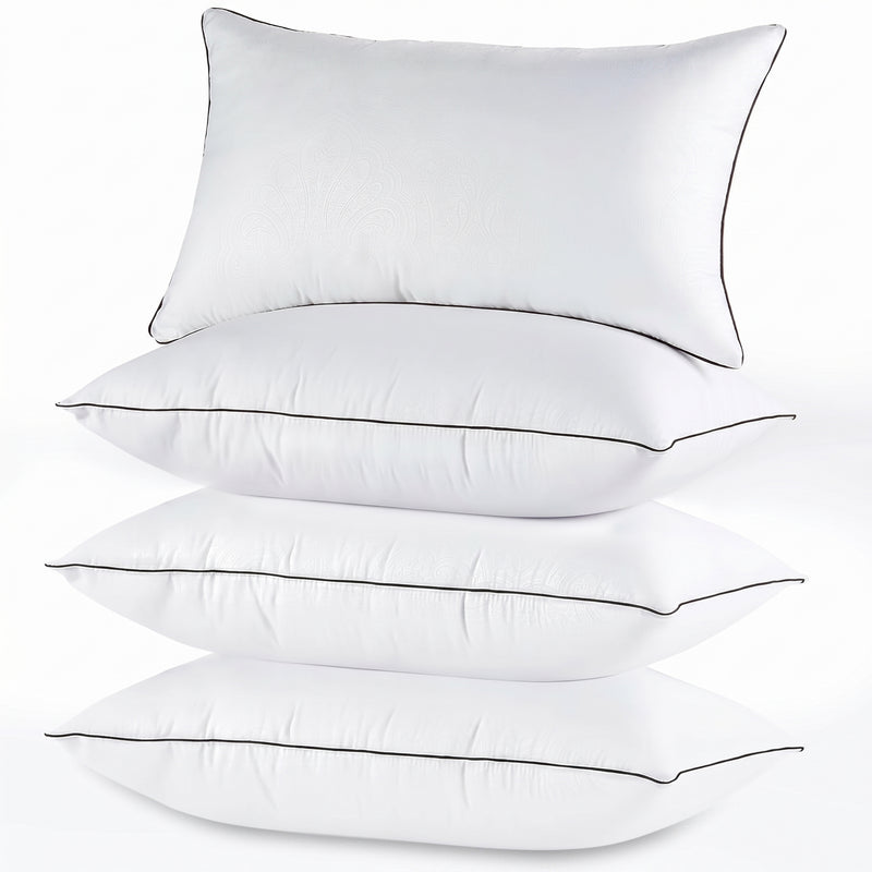 Two down alternative pillows with brown piping and a subtle damask pattern, stacked on a white background