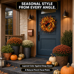 Artificial fall wreath displayed on a front door, porch and above a fireplace