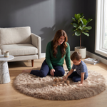 Grey faux fur runner rug styled in an entryway beside a console table on hardwood flooring