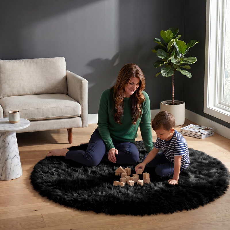 Grey faux fur runner rug styled in an entryway beside a console table on hardwood flooring