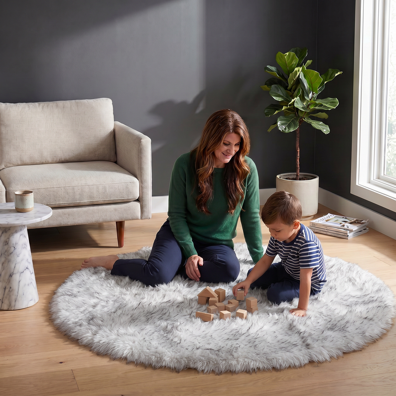 Grey faux fur runner rug styled in an entryway beside a console table on hardwood flooring