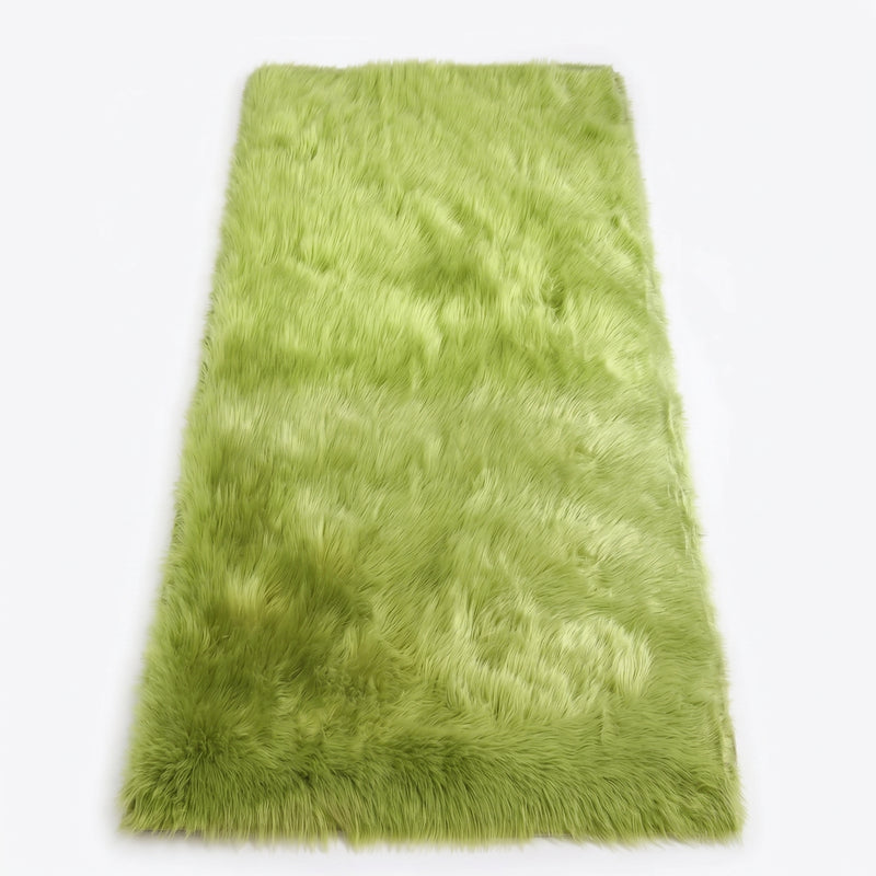 Close-up of grey faux fur area rug showing thick high-pile shaggy texture