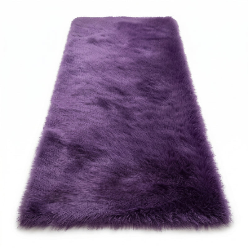Close-up of grey faux fur area rug showing thick high-pile shaggy texture