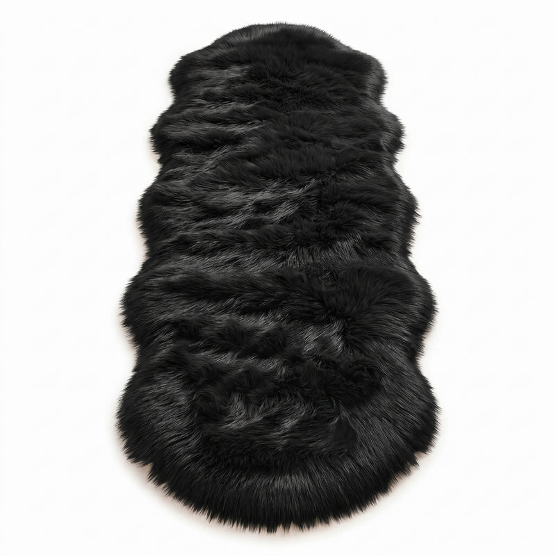 Close-up of grey faux fur area rug showing thick high-pile shaggy texture