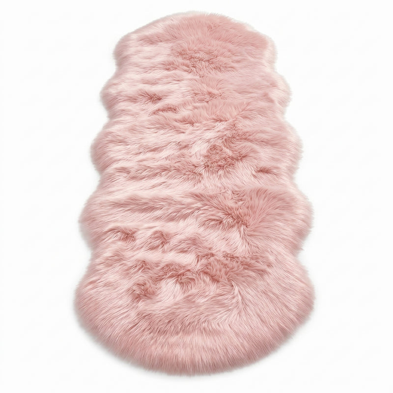 Close-up of grey faux fur area rug showing thick high-pile shaggy texture