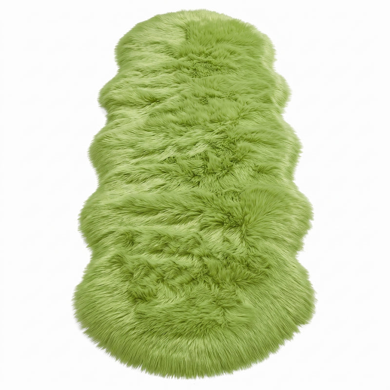 Close-up of grey faux fur area rug showing thick high-pile shaggy texture