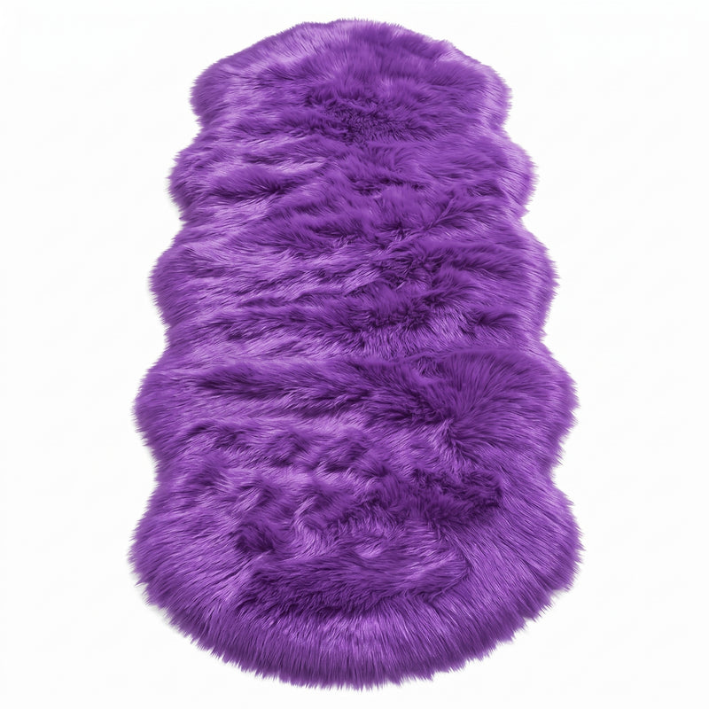 Close-up of grey faux fur area rug showing thick high-pile shaggy texture