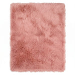 Close-up of grey faux fur area rug showing thick high-pile shaggy texture