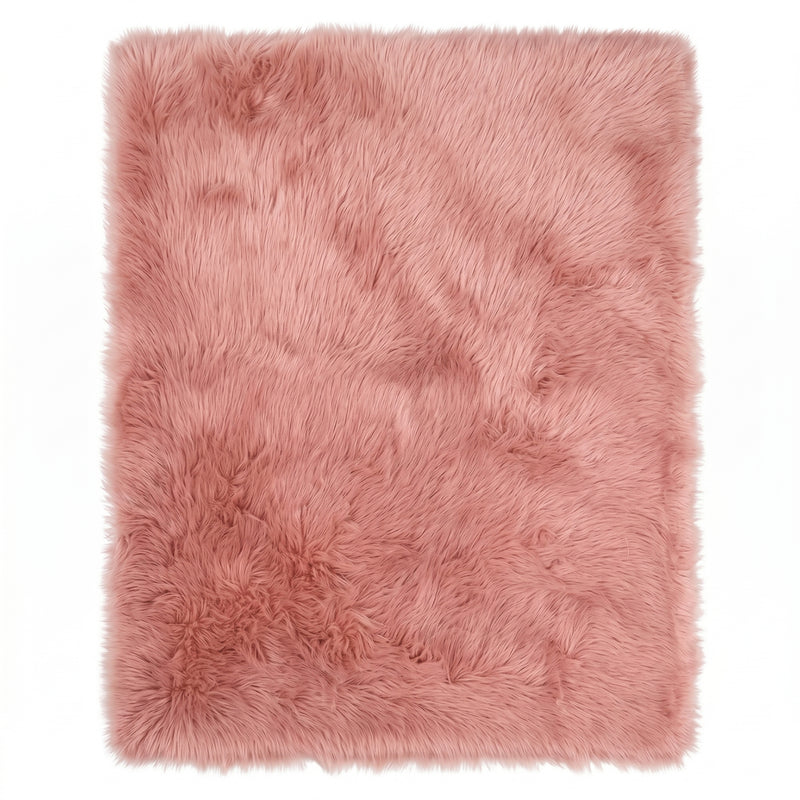 Close-up of grey faux fur area rug showing thick high-pile shaggy texture