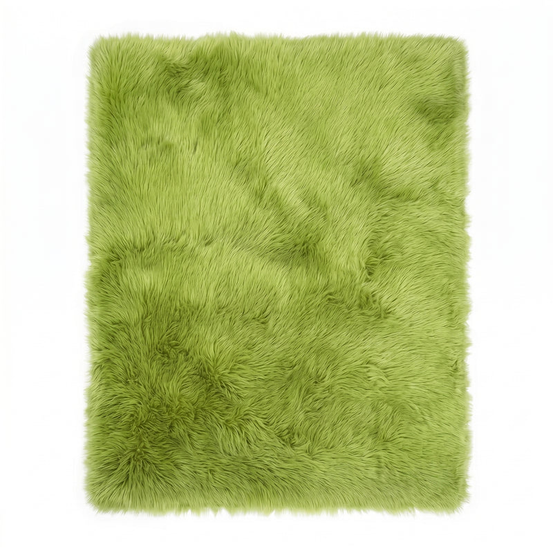 Close-up of grey faux fur area rug showing thick high-pile shaggy texture