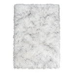 Close-up of grey faux fur area rug showing thick high-pile shaggy texture