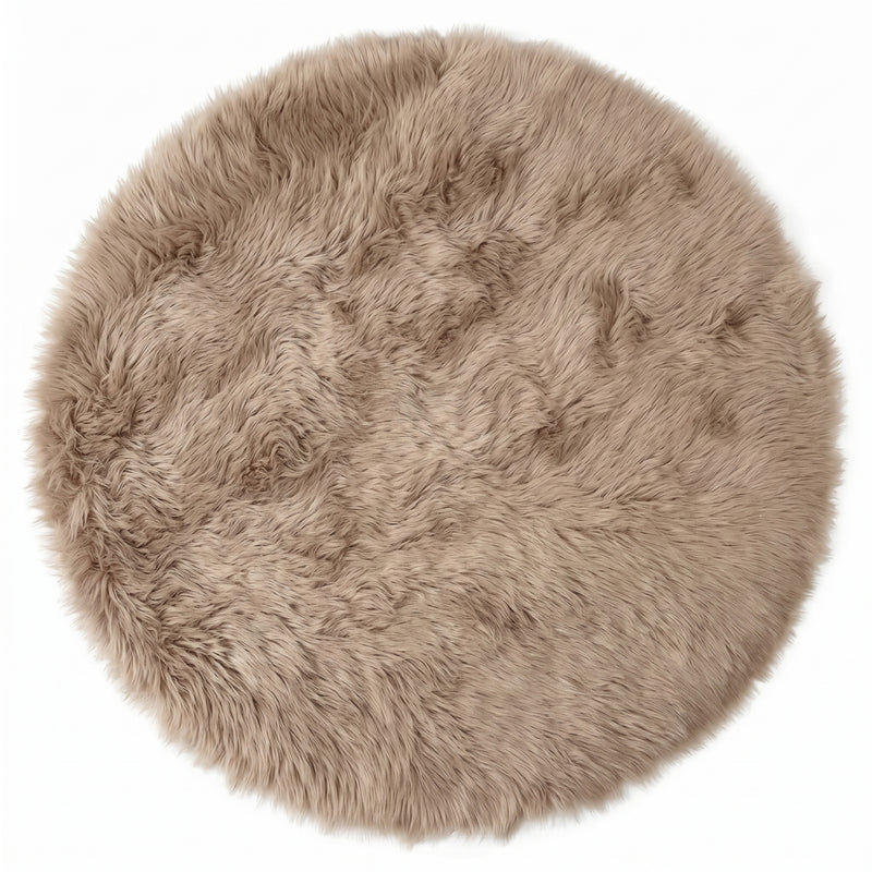 Close-up of grey faux fur area rug showing thick high-pile shaggy texture