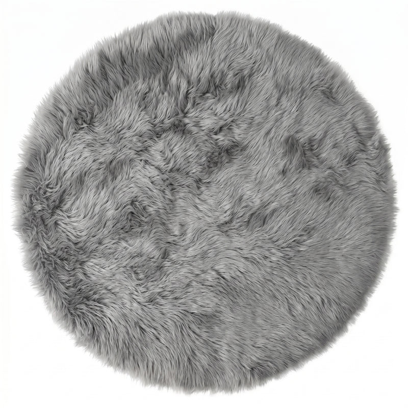 Close-up of grey faux fur area rug showing thick high-pile shaggy texture