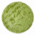 Close-up of grey faux fur area rug showing thick high-pile shaggy texture
