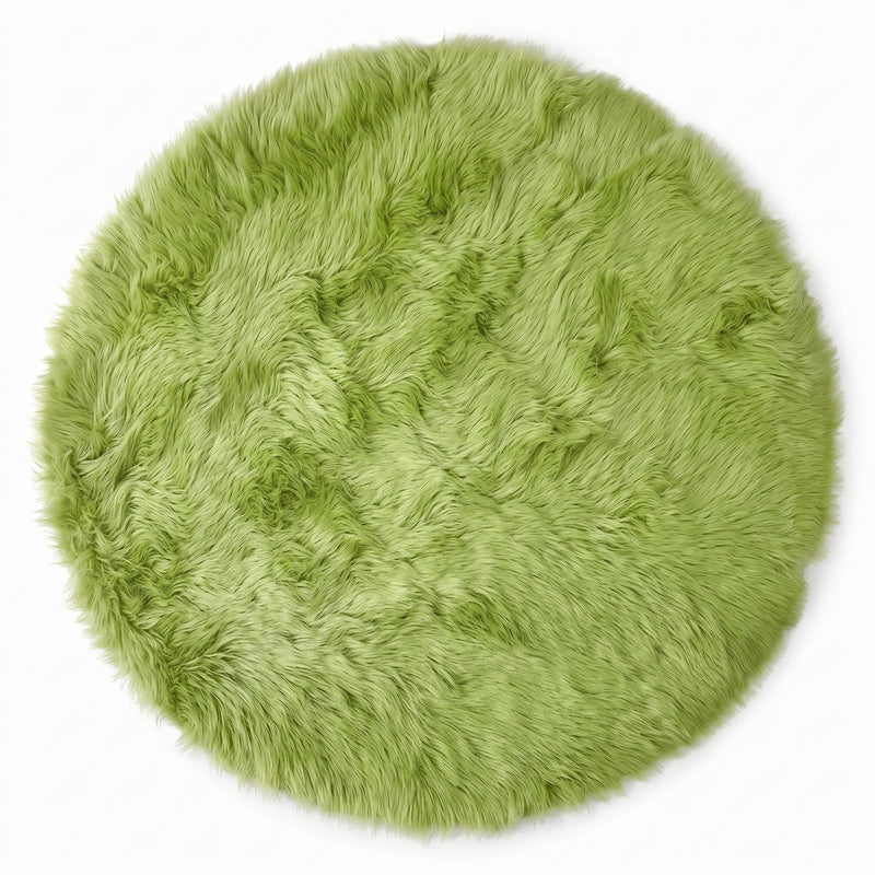 Close-up of grey faux fur area rug showing thick high-pile shaggy texture