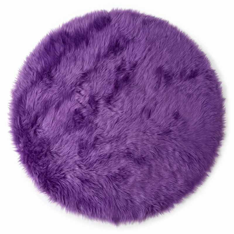 Close-up of grey faux fur area rug showing thick high-pile shaggy texture