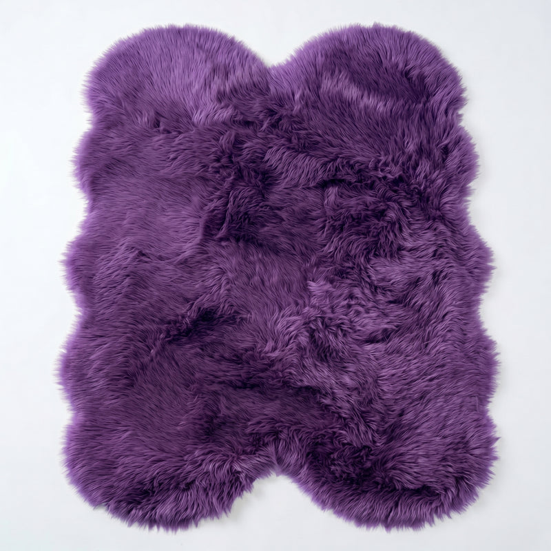 Close-up of grey faux fur area rug showing thick high-pile shaggy texture