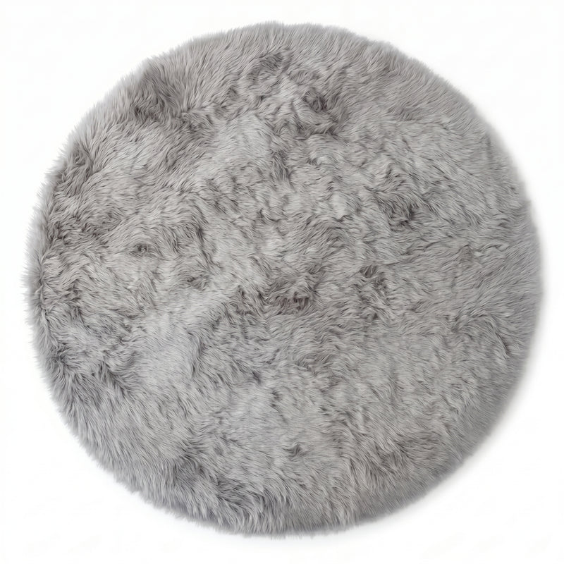 Close-up of grey faux fur area rug showing thick high-pile shaggy texture