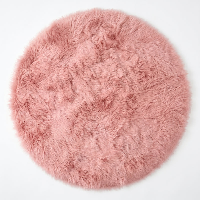 Close-up of grey faux fur area rug showing thick high-pile shaggy texture