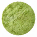 Close-up of grey faux fur area rug showing thick high-pile shaggy texture