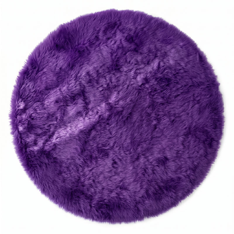 Close-up of grey faux fur area rug showing thick high-pile shaggy texture