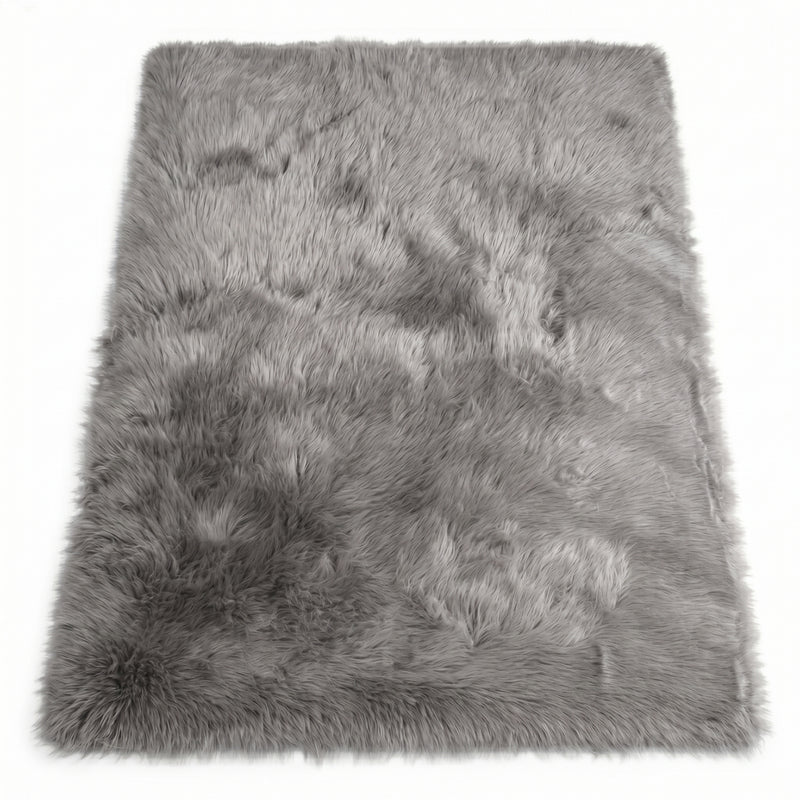 Close-up of grey faux fur area rug showing thick high-pile shaggy texture