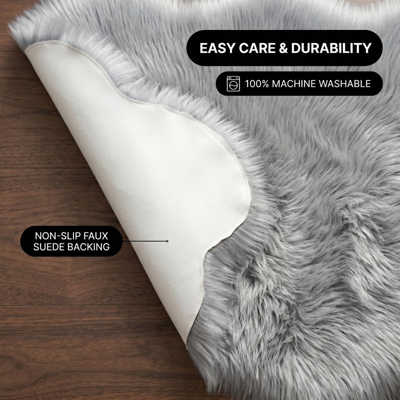 Faux fur area rug shown beside a bed, illustrating machine-washable, vacuum-or-shake-clean maintenance