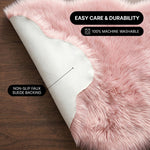 Faux fur area rug shown beside a bed, illustrating machine-washable, vacuum-or-shake-clean maintenance
