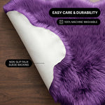 Faux fur area rug shown beside a bed, illustrating machine-washable, vacuum-or-shake-clean maintenance