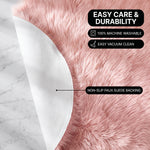 Faux fur area rug shown beside a bed, illustrating machine-washable, vacuum-or-shake-clean maintenance