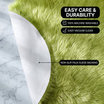 Faux fur area rug shown beside a bed, illustrating machine-washable, vacuum-or-shake-clean maintenance