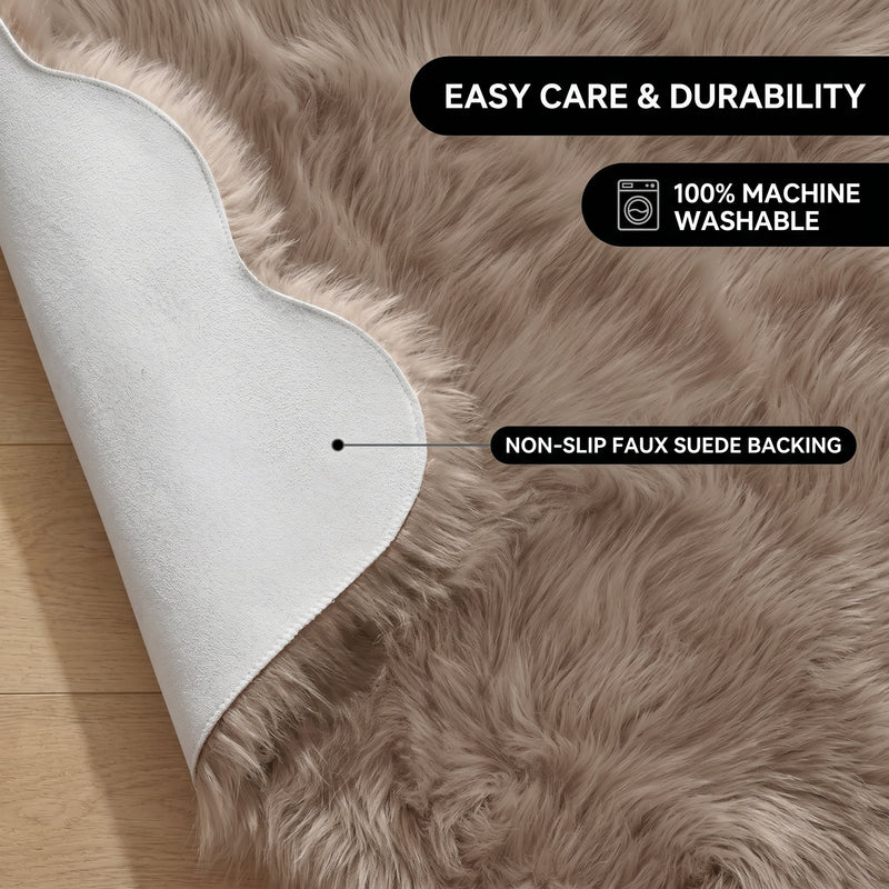 Faux fur area rug shown beside a bed, illustrating machine-washable, vacuum-or-shake-clean maintenance