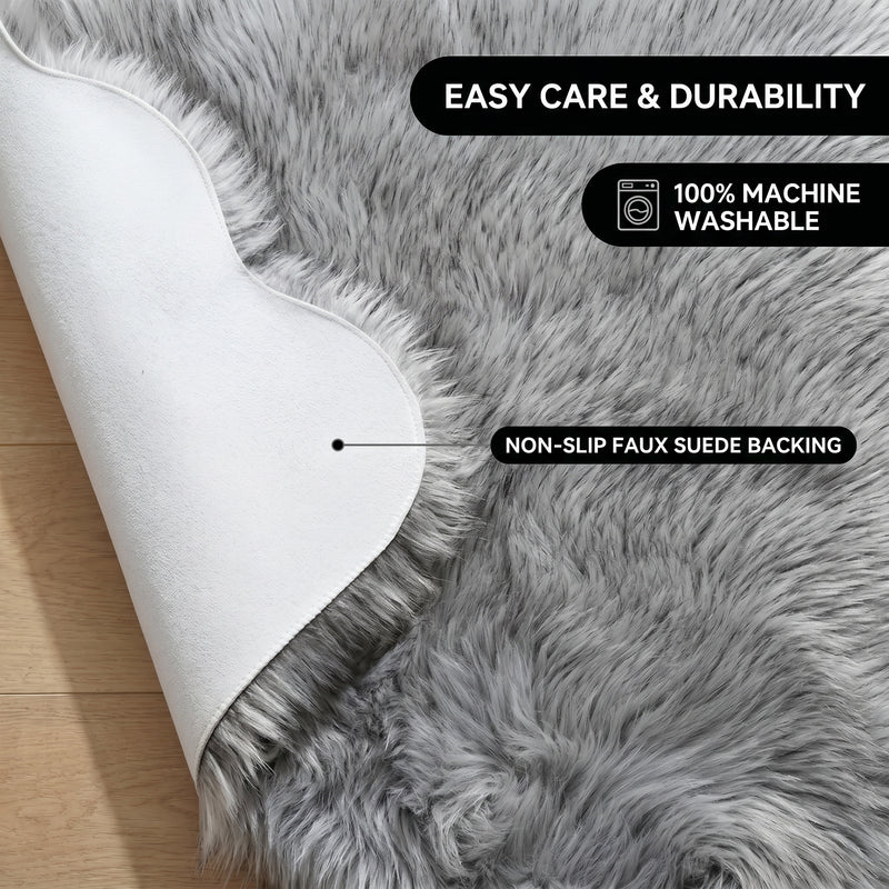 Faux fur area rug shown beside a bed, illustrating machine-washable, vacuum-or-shake-clean maintenance