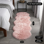 Faux fur area rug with a coffee mug on top, highlighting the 2.36-inch ultra-plush pile and lightweight design