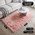 Faux fur area rug with a coffee mug on top, highlighting the 2.36-inch ultra-plush pile and lightweight design