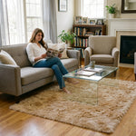 Faux fur sheepskin rug on a closet floor with a woman standing barefoot while reaching for a hanger