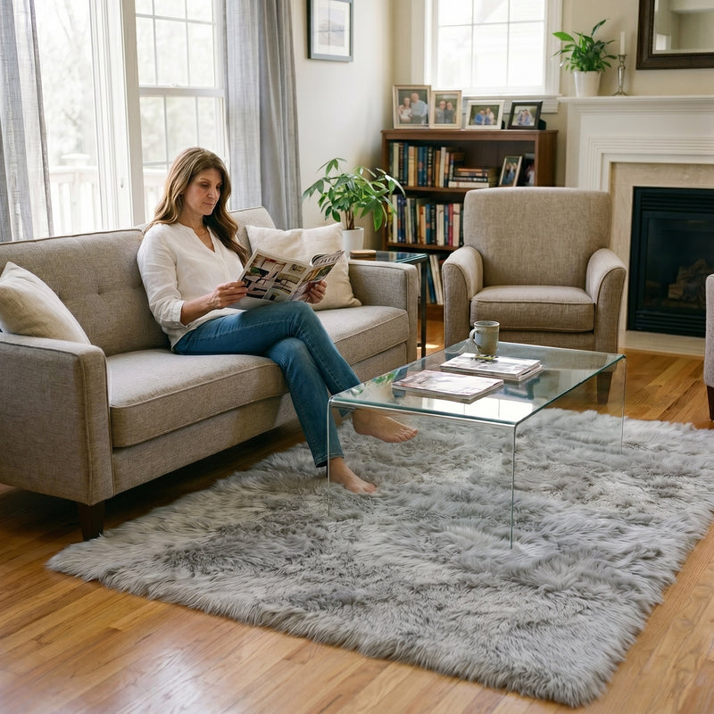 Faux fur sheepskin rug on a closet floor with a woman standing barefoot while reaching for a hanger