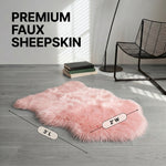Faux fur sheepskin rug runner at the foot of a bed, labeled 72 inches long by 24 inches wide with slippers resting on top