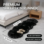 Faux fur sheepskin rug runner at the foot of a bed, labeled 72 inches long by 24 inches wide with slippers resting on top