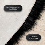 Close-up of the rug's faux suede backing and stitched edge