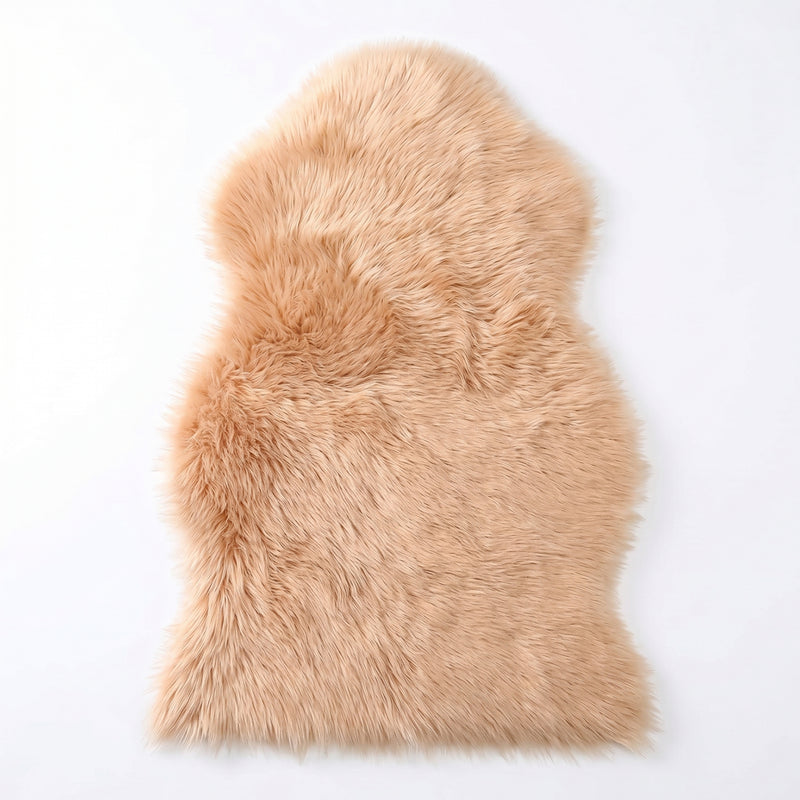 Faux fur sheepskin rug in white and yellow, shown flat from above in its natural pelt shape