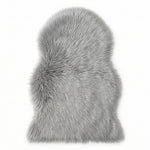 Faux fur sheepskin rug in white and yellow, shown flat from above in its natural pelt shape