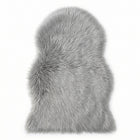 Faux fur sheepskin rug in white and yellow, shown flat from above in its natural pelt shape