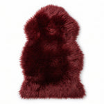 Faux fur sheepskin rug in white and yellow, shown flat from above in its natural pelt shape