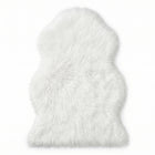 Faux fur sheepskin rug in white and yellow, shown flat from above in its natural pelt shape