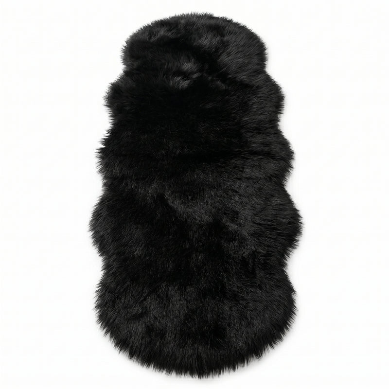 Faux fur sheepskin rug in white and yellow, shown flat from above in its natural pelt shape