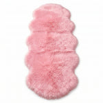 Faux fur sheepskin rug in white and yellow, shown flat from above in its natural pelt shape