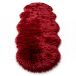 Faux fur sheepskin rug in white and yellow, shown flat from above in its natural pelt shape